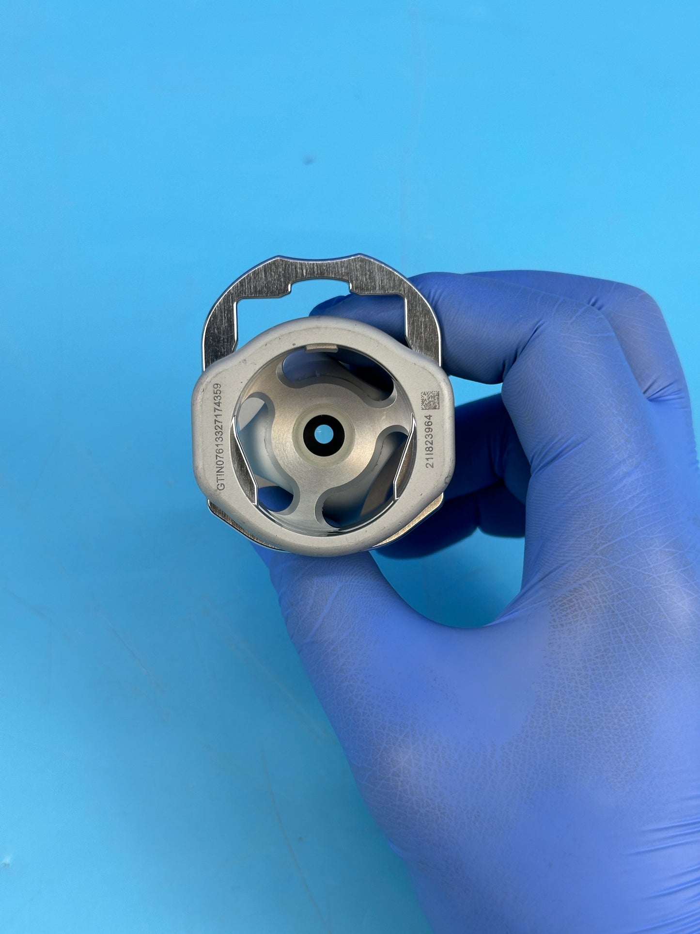 coupler threads onto the face of the camera head, enabling a scope to be attached to the camera.