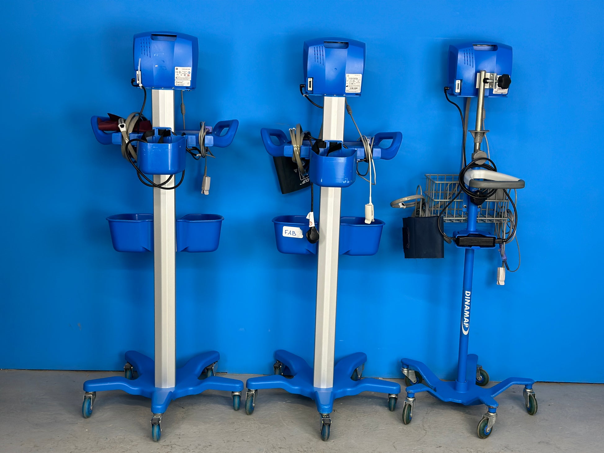 Rear side view of the Dinamap V100 Patient Monitor with Stand