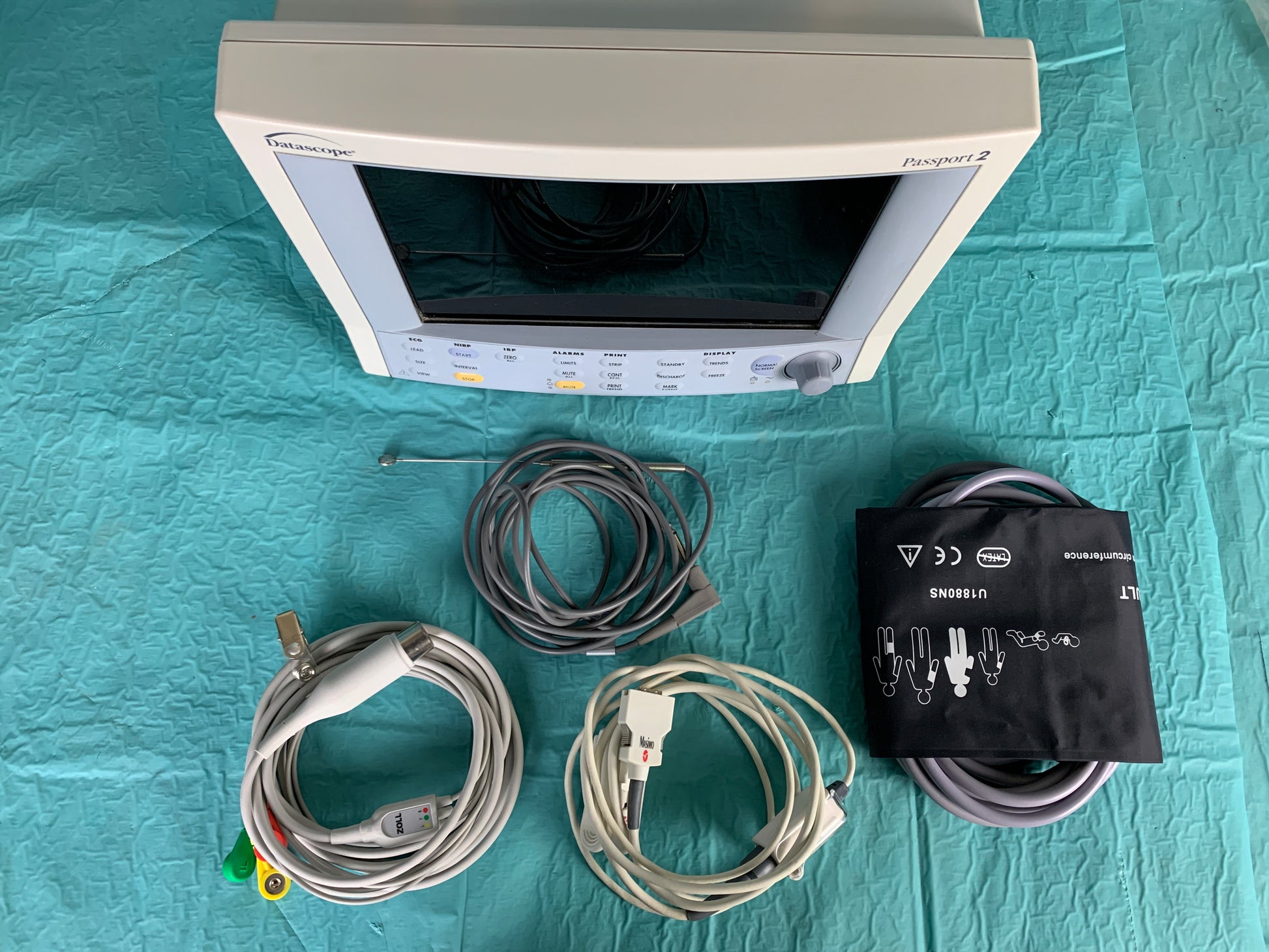 Passport Cardiac Monitor showing different parameters values comes with accessories and module