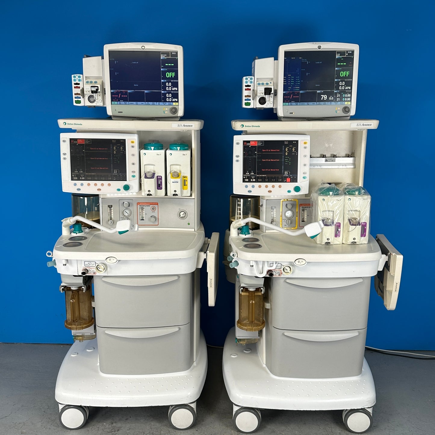 Two units of Datex Ohmeda anesthesia Avance s/5 Machine with accessories powered on
