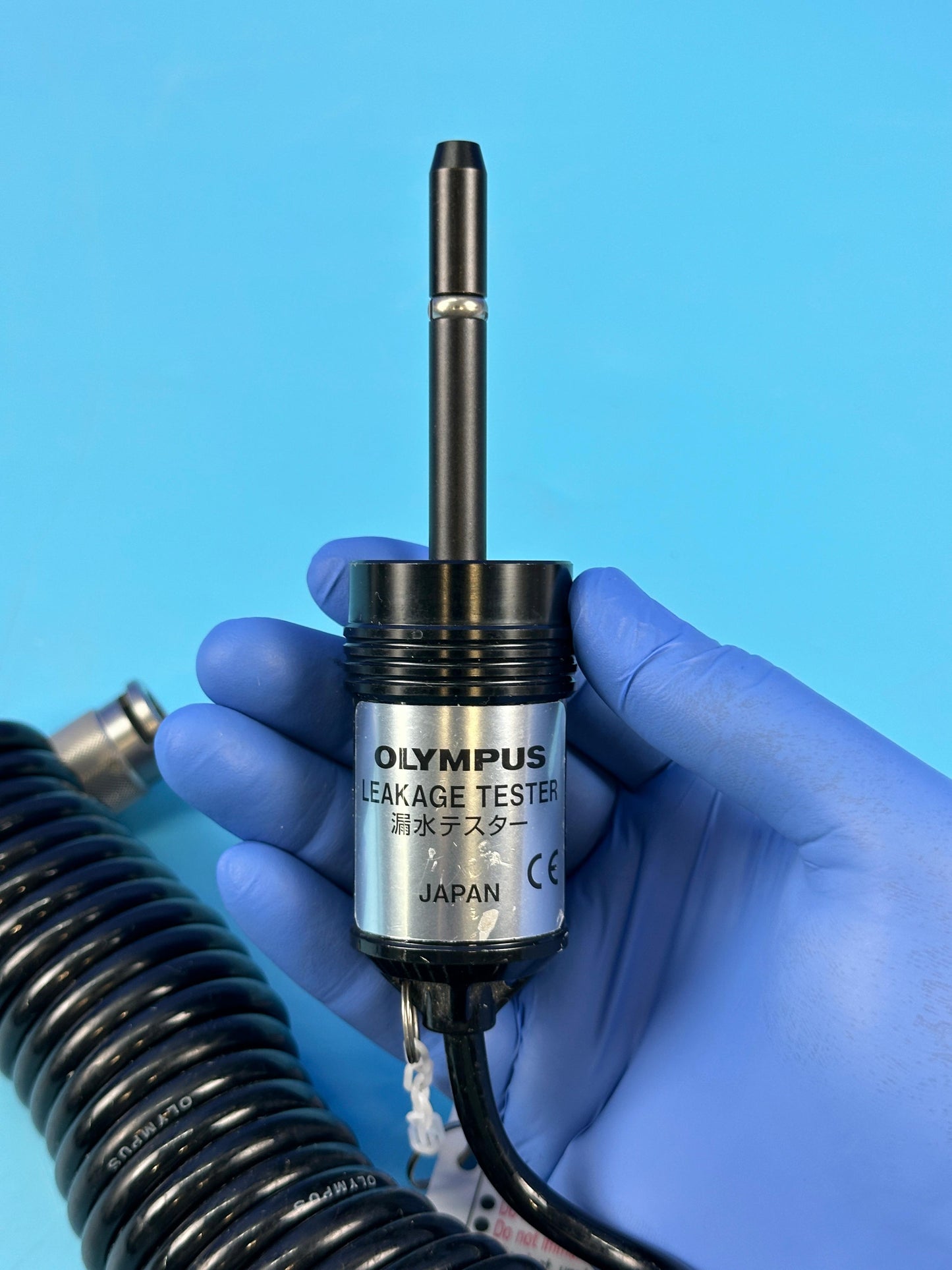 Connected to the endoscope with tubing and appropriate connectors to irrigate with air, water or alcohol
