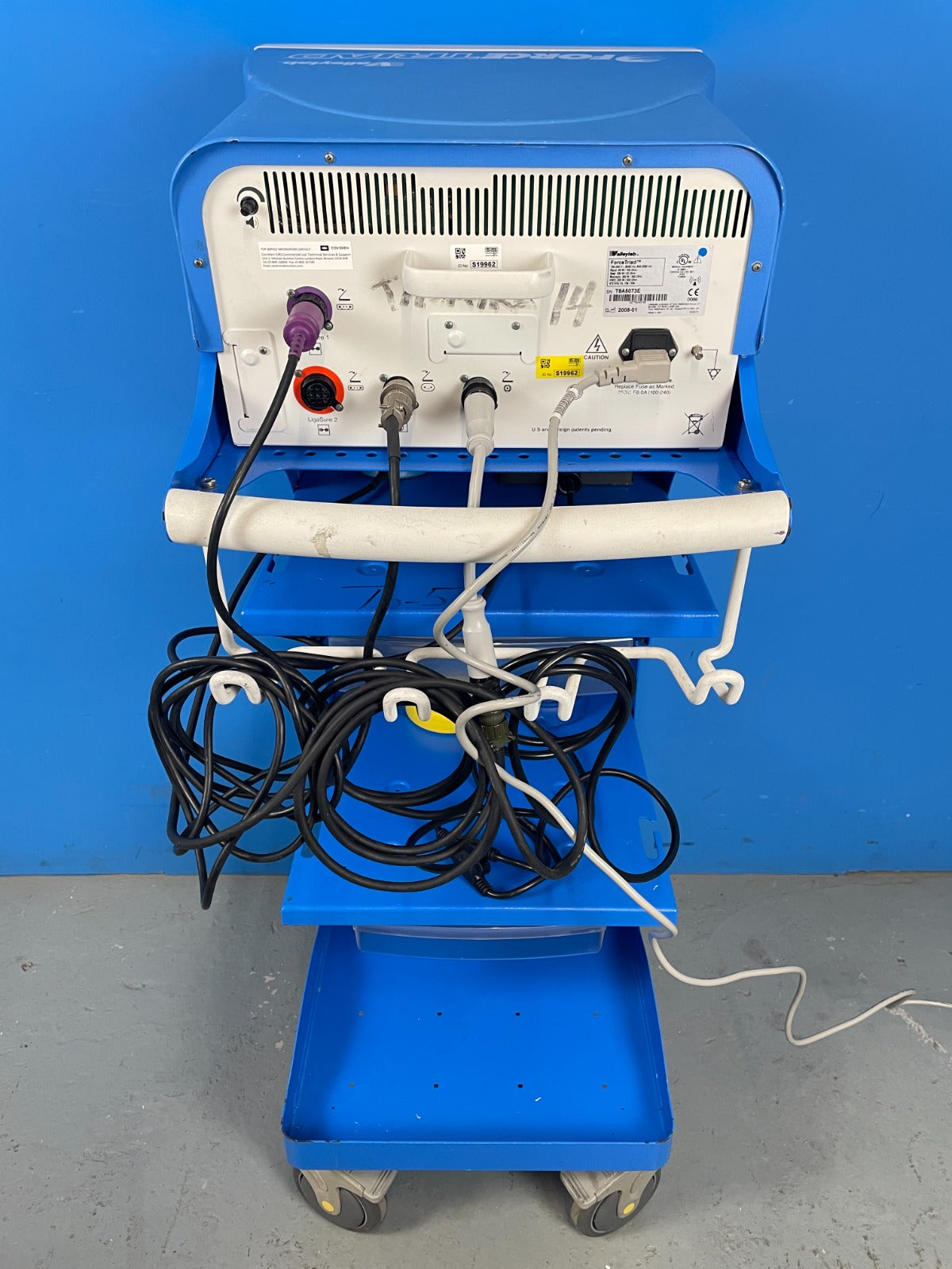 Rear side view of the ForceTriad Cautery on cart
