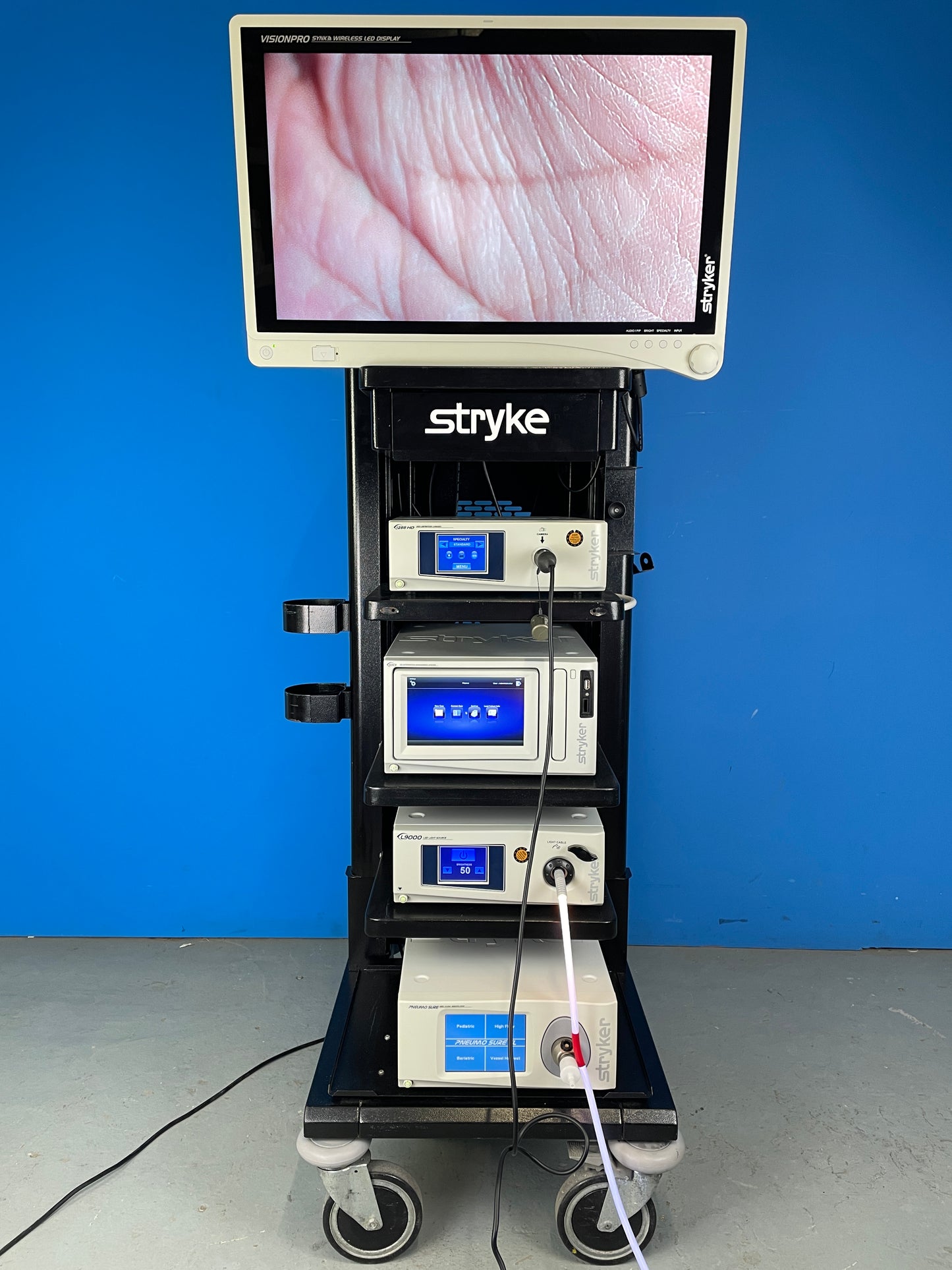Stryker 1288 HD High Definition Camera Control Unit. Stryker 1288 HD Camera Head. Stryker L9000 LED Light Source. Stryker PNEUMO SURE XL High Flow Insufflator. Stryker SDC Ultra HD Information Management System Stryker VisionPro Surgical Viewing Monitor 26'' Inch Stryker Trolley