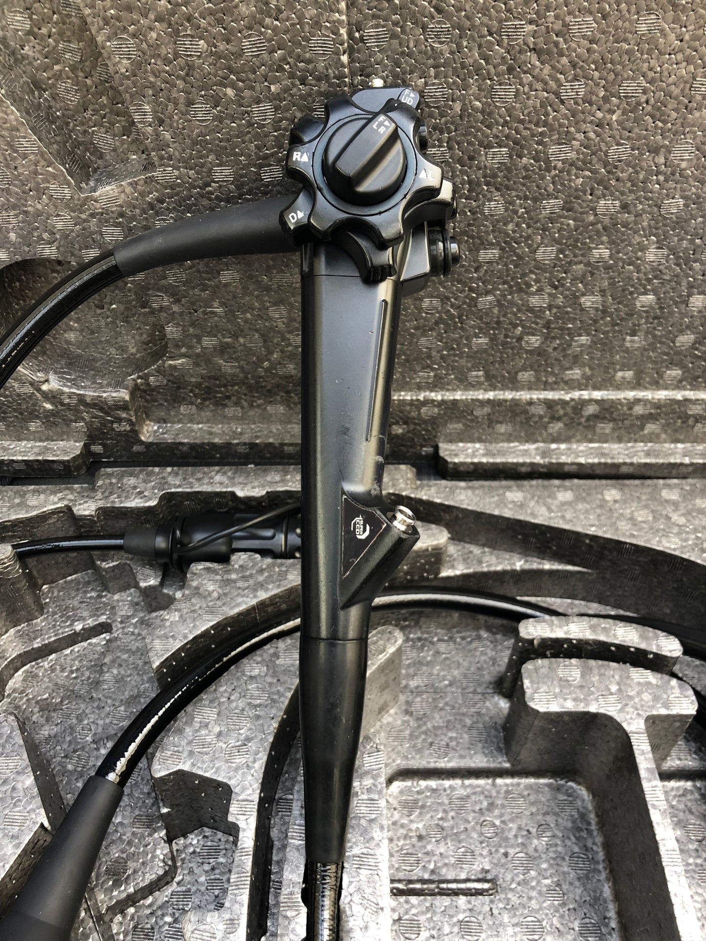 The larger, outer control knob is used for the vertical (up or down) movement of the tip and the smaller, inner knob is used for the lateral (left or right) movement of the tip.