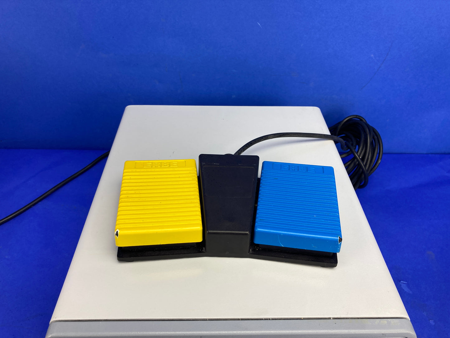Foot paddles controls differentiated control of multiple functions.