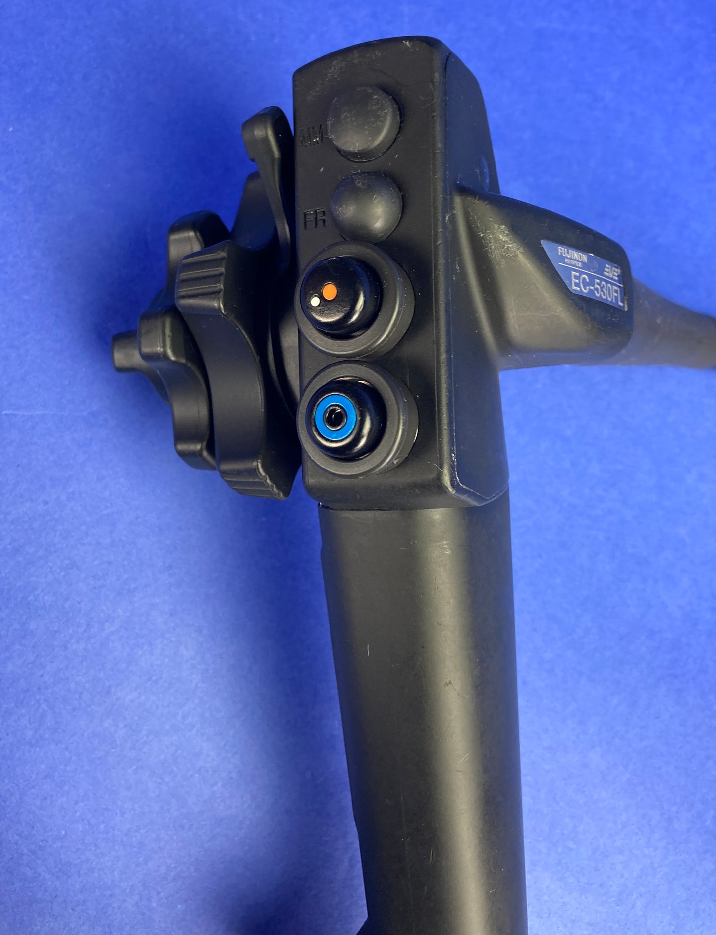 Control section , Suction Button, Air/Water button with Angulation control knob