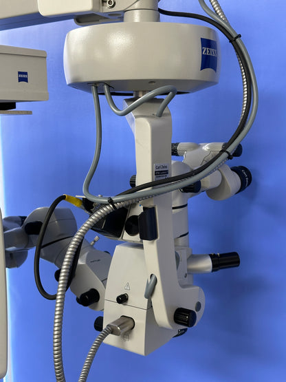 Integrated fully stereoscopic assistant’s microscope with no light loss for the main surgeon